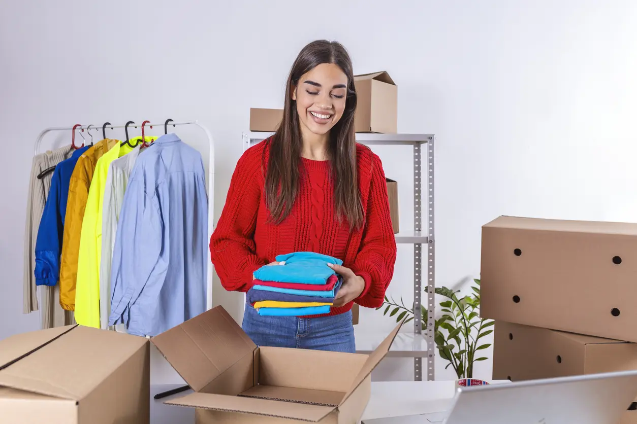 direct-to-garment-printing-services-about-woman-putting-tshirt-into-the-box-orange-road-ca direct-to-garment-printing-services-about-woman-putting-tshirt-into-the-box-orange-road-ca